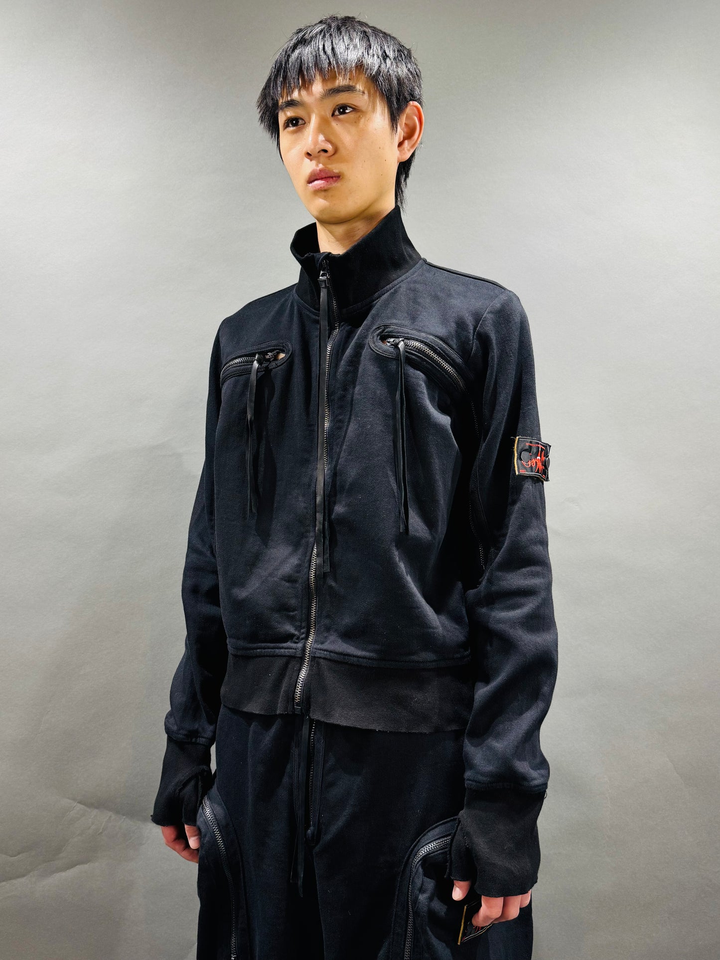 SYUMAN. Jet track jacket