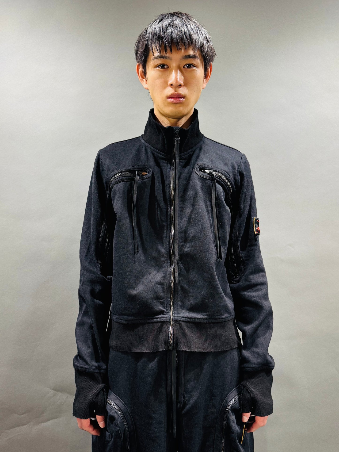 SYUMAN. Jet track jacket