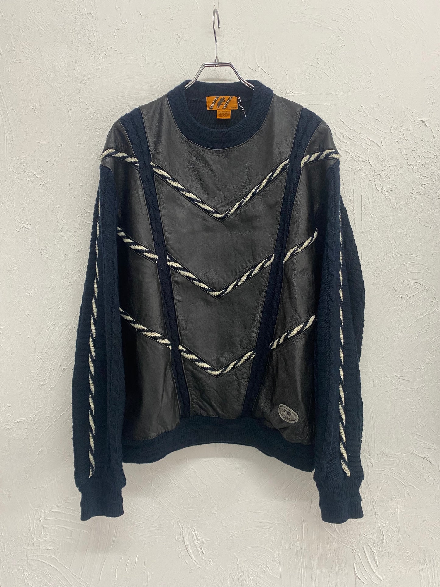 leather switching design knit