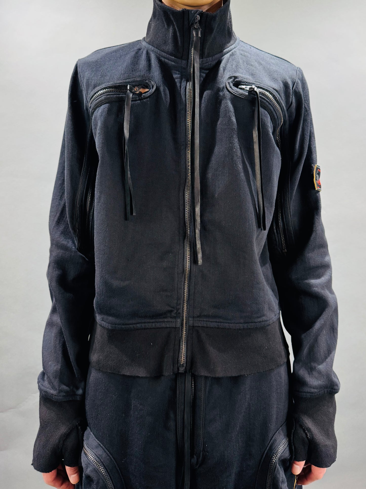 SYUMAN. Jet track jacket